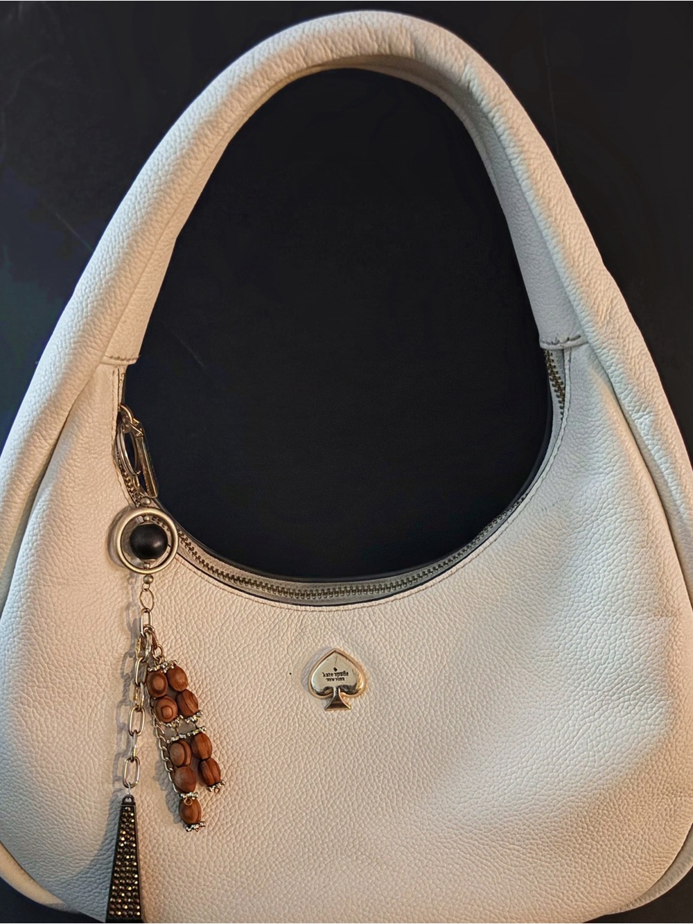 Kate Spade New York Kayla Crescent Shoulder Bag in meringue color. Like new
